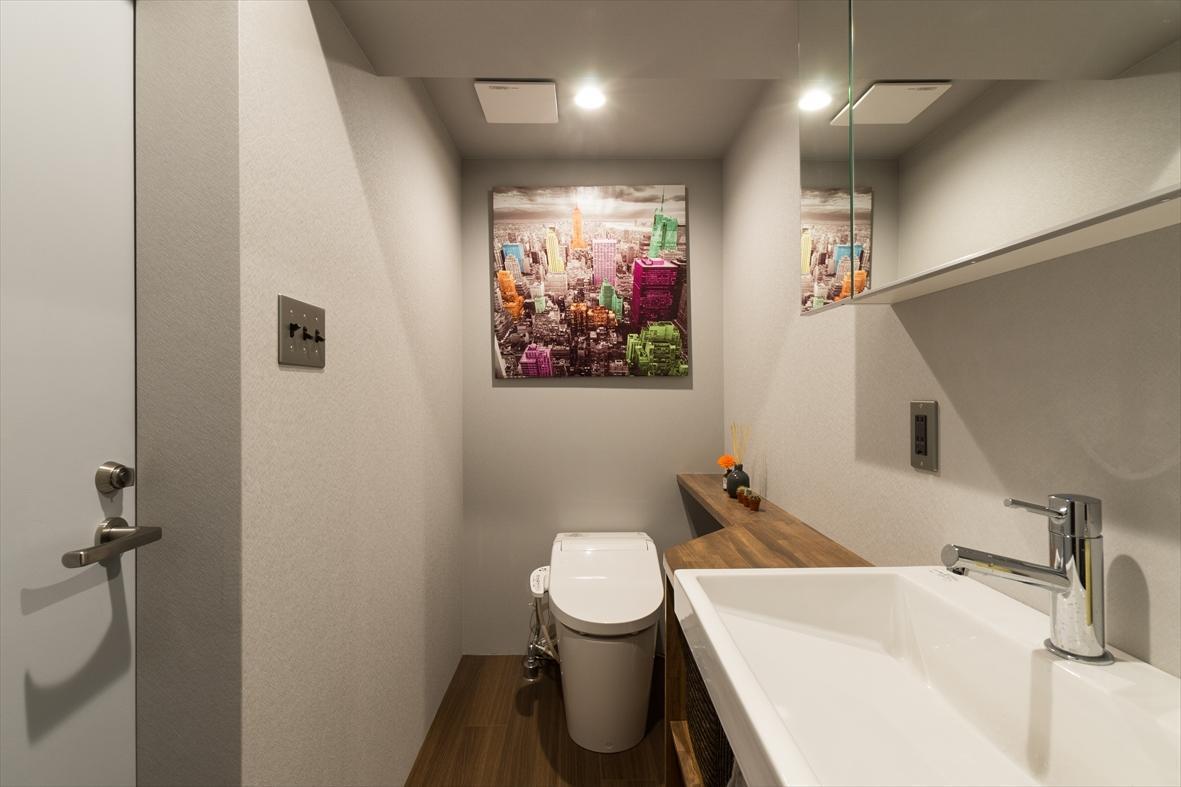 バス/トイレ事例：洗面室（石張り壁のあるフルリノベーション：『品川区五反田のリノベーション』）
