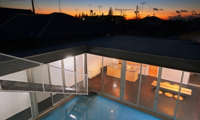 屋上から見た夕景｜水庭の家