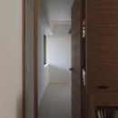 百合ヶ丘の家-ライフスタイルに合わせたひと続きの空間の写真 玄関・土間
