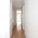 高島平の家-敷地形状を活かした伸びやかな住空間の写真 廊下