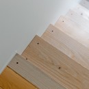 モルタル×木×アイアンのモダンアメリカンな住まいの写真 階段