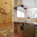 大阪府Ｓさん邸：中古リノベーションで開放感のある個性的な空間にの写真 カフェの厨房風キッチン