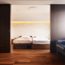南国のリゾートホテルのような空間を東京の自宅で実現の写真 寝室