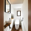 こだわりのメキシカンモダンの写真 落ち着いた色合いでヴィンテージ感のあるトイレ