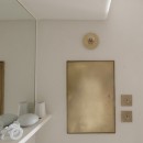 House I／マンションリノベーションの写真 真鍮で作った洗面所の収納