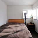 癒しのアジアンリゾートの住まいの写真 すっきりシンプルな寝室