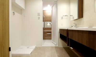 洗面室全体｜タイルと間接照明の高級感ある空間