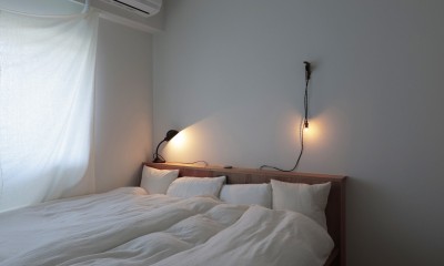 朝霧のマンションリフォーム／一枚の壁で生まれる多様なスペース (寝室)