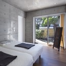 コンクリート打放し「H型プランの平屋」– 全ての部屋に光と風を –の写真 ベッドルーム