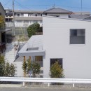 美崎町の家(くぼみのある敷地に建つ家)の写真 外観1