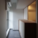 桃山台のマンションリフォーム／個室は控えめに、家族の居場所は最大限にの写真 玄関土間