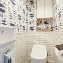 多趣味なご夫婦のこだわりを詰め込んだリノベーションの写真 トイレ