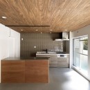 グレー床のミニマルな空間の写真 キッチン