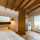夫婦で暮らすミニマルな木造空間　：　大津の住宅の写真 寝室