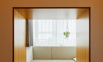 ヌックスペース｜開放感に包まれた勾配天井が美しいマンションリノベ