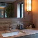 太子堂の家　〜素材感のあるマンションリノベーション〜の写真 洗面台
