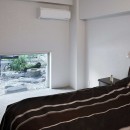 ホワイトモダンな二世帯住宅の写真 ベッドルーム