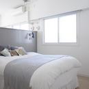 S邸の写真 ホワイト&グレーの光が差し込む寝室