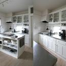 M邸の写真 白とステンレスを基調としたアイランド型キッチン